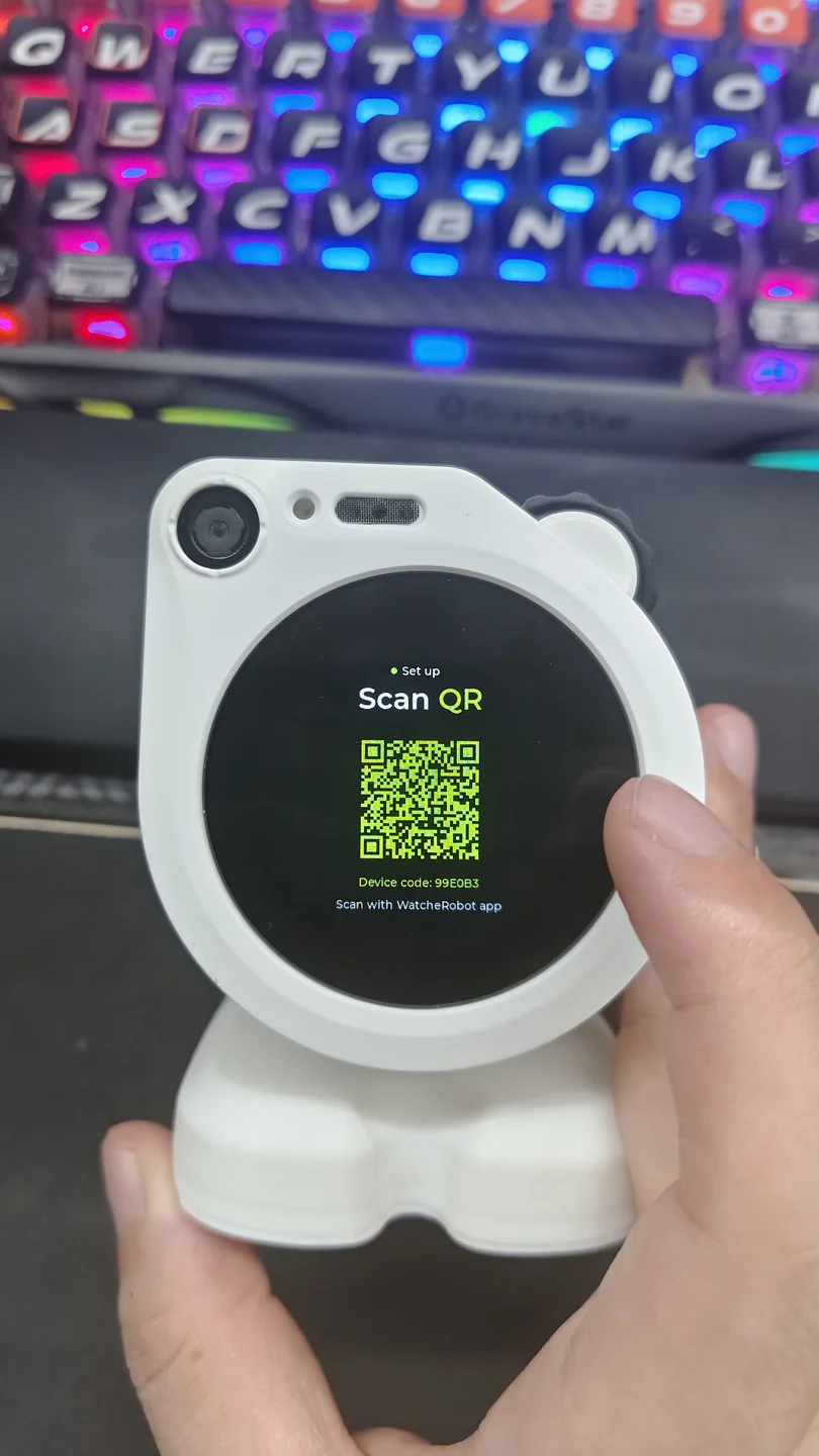The robot displays its provisioning QR code